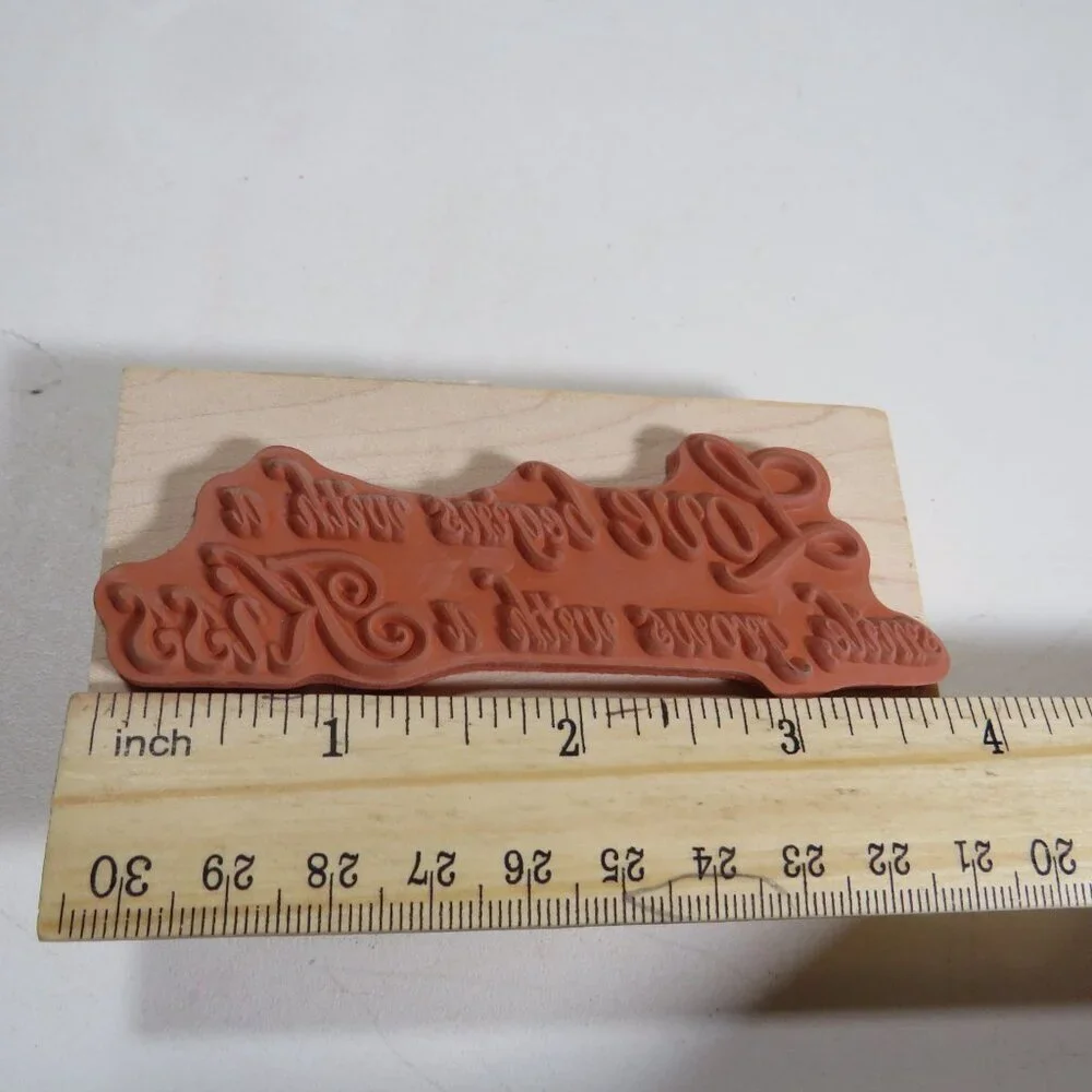 Love begins with a smile...Wood Block Word Rubber Stamp